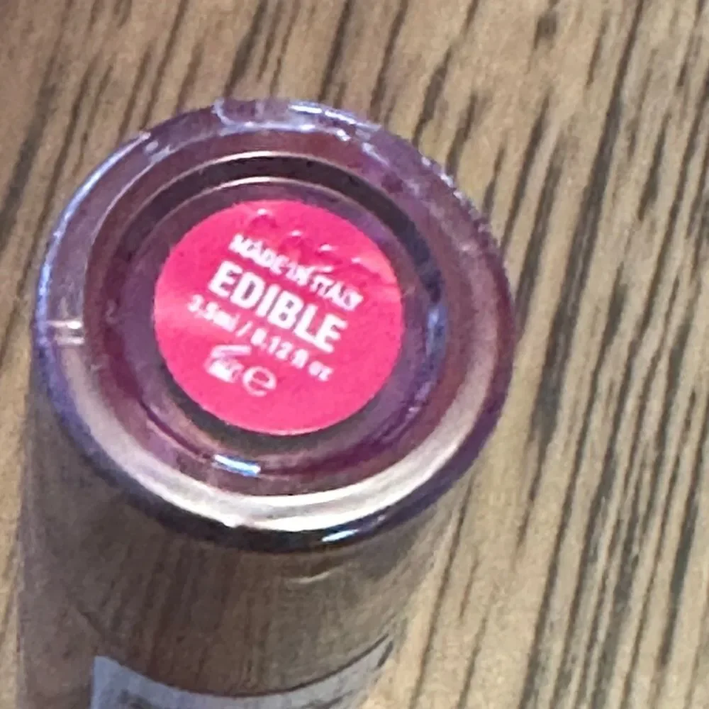 Sharon C Uoma edible lipgloss brown made in Italy